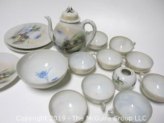 Japanese Porcelain including teapot, 3 plates, 9 cups and 1 soup bowl