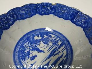 Blue and White Hand Decorated Ceramic Bowl (Note: chip on rim); 9 1/2" wide at rim