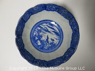 Blue and White Hand Decorated Ceramic Bowl (Note: chip on rim); 9 1/2" wide at rim