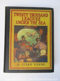 Book Title: "Twenty Thousand Leagues Under The Sea" by Jules Verne; pub by Charles Scribner'sSons; 1932 {Note: signed Philip S. Barry, Mt. Kisco, NY.}  