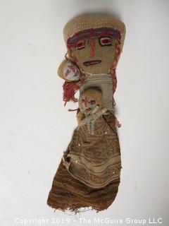 Vintage primitive doll carrying two children; 8" tall