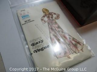 Vintage celluloid cosmetic case and Vogue dress pattern