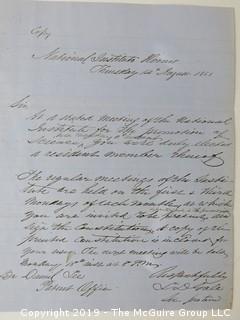 "National Institute For The Promotion of Science; 1840"; leather bound ledger. This is an important historical, scientific and cultural artifact.  Every page and piece of paper has been photographed. The National Institute was the initial repository for collections of artifacts brought to the U.S. by the United States Exploring Expedition of 1838, as well as various other objects accumulated by the government, such as items owned by early American politicians, patent models, and natural objects.  There is an entry on page 25 that records the transfer of a desk used by George Washington to the Institute, as Directed by the President of the United States, with a signature of Z. Taylor. 
The signature has not been authenticated, but it does appear to be in a hand other than the recording secretary. Such artifacts were the precursor to the Smithsonian Institution collection. (142 photos) {Description Altered: Feb. 18; 7:42pm ET; 2019}  