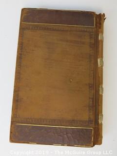 "National Institute For The Promotion of Science; 1840"; leather bound ledger. This is an important historical, scientific and cultural artifact.  Every page and piece of paper has been photographed. The National Institute was the initial repository for collections of artifacts brought to the U.S. by the United States Exploring Expedition of 1838, as well as various other objects accumulated by the government, such as items owned by early American politicians, patent models, and natural objects.  There is an entry on page 25 that records the transfer of a desk used by George Washington to the Institute, as Directed by the President of the United States, with a signature of Z. Taylor. 
The signature has not been authenticated, but it does appear to be in a hand other than the recording secretary. Such artifacts were the precursor to the Smithsonian Institution collection. (142 photos) {Description Altered: Feb. 18; 7:42pm ET; 2019}  