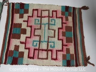 Pair of Navajo Single Saddle Blankets; note the color bleed; each 18 1/2 x 23"