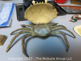 Collection including "Next Week" paperweight, brass crab, keepsake box, Mid-Century Coasters, and letter openers 