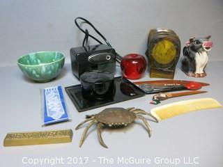 Collection including "Next Week" paperweight, brass crab, keepsake box, Mid-Century Coasters, and letter openers 