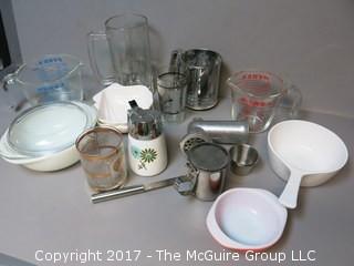 Collection of mid-century dishware including Corning, Pyrex, sifter and liter glass mug