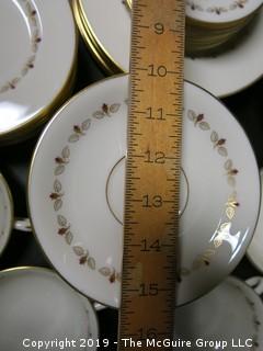 (87) pieces of Lenox "Romance" Pattern China: (12) dinner plates, (7) salad plates, (8) 7" diameter plates, (12) 6 1/4" diameter plates, (12) saucers, (7) demitassecups /(8) saucers, (13) coffee cups/ (12) saucers, (8) soup bowls