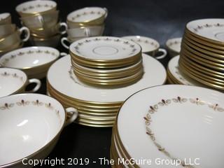 (87) pieces of Lenox "Romance" Pattern China: (12) dinner plates, (7) salad plates, (8) 7" diameter plates, (12) 6 1/4" diameter plates, (12) saucers, (7) demitassecups /(8) saucers, (13) coffee cups/ (12) saucers, (8) soup bowls