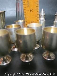 Collection including small sterling goblets and cut glass shaker with sterling top, 300 grams