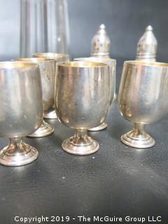 Collection including small sterling goblets and cut glass shaker with sterling top, 300 grams