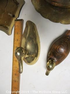 Collection of brass including coffee grinder; horn and flatiron