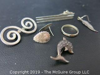 Collection of Sterling jewelry including 3 pins and 1 ring