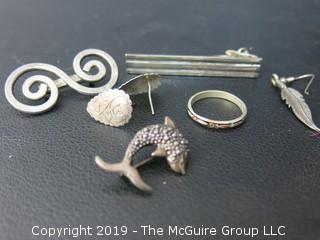 Collection of Sterling jewelry including 3 pins and 1 ring