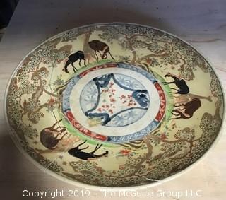 16" diameter Asian Ceramic Platter Shards (as found).  Note the  inventory sticker near the center.  