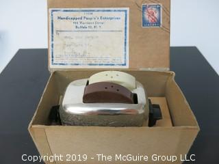 " Miniature Toaster"; made by Handicapped People's Enterprises, Buffalo, NY