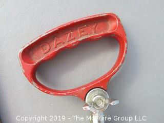 "Dazey" beater with red painted metal handle