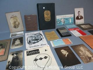 Collection including early photographs, playbills, M-C advertising, and pocket calculator