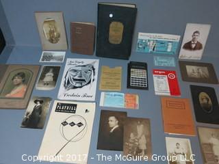 Collection including early photographs, playbills, M-C advertising, and pocket calculator