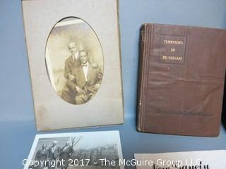 Collection including early photographs, playbills, M-C advertising, and pocket calculator