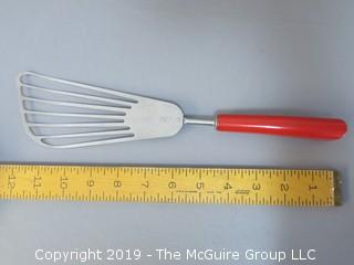 Slotted Stainless Spatula with bakelite handle; red