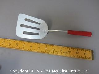 Slotted Spatula with red bakelite handle