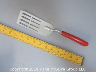 A&J Slotted Spatula with red bakelite handle