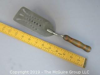 Slotted Spatula with wood handle; unpainted