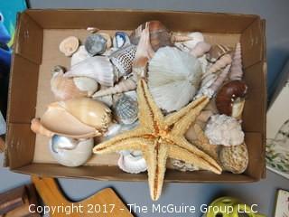 Collection including sea shells, vintage cutting boards, vintage Valentine's Day Card, (3) NIB Nemo puzzles and a botanical jar 