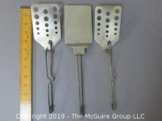 Collection of Operator Activated Flipper Slotted Spatulas; including A&J