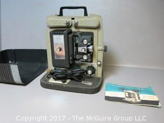 Promatic Model 8-Z 8mm Automatic Movie Projector with instruction book and case