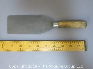 Spatula with wood handle; unpainted; marked Harrington Cutlery