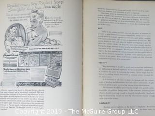 Book Title: "Advertising Layout: The Projection of an Idea"; authored by Richard S. Chenault; editor of The American Magazine; printed by Oberly and Newell Lithograph Co.; 2nd printing; published by Heck-Cattell, New York; 1946