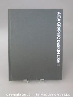 Book Title: "AIGA Graphic Design USA: 1 -The Annual of the American Institute of Graphic Arts"; authored by C. Ray Smith; designed by Miho; published by Watson-Giptill, New York;  1980