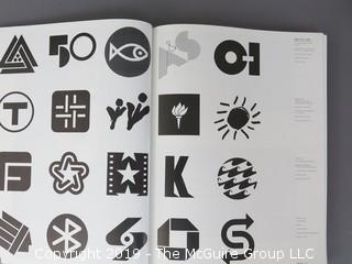 Book Title: "AIGA Graphic Design USA: 1 -The Annual of the American Institute of Graphic Arts"; authored by C. Ray Smith; designed by Miho; published by Watson-Giptill, New York;  1980