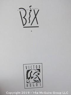 Book Title: "Graphics Logo 1: The International Survey of Logo Design"; creative director and publisher B. Martin Pedersen; printed by Graphics Press Corp. of Switzerland; 1991