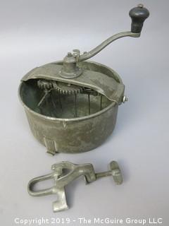 Hand cranked mixer; marked on base; includes counter bracket