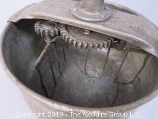 Hand cranked mixer; marked on base; includes counter bracket