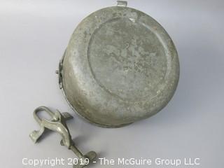 Hand cranked mixer; marked on base; includes counter bracket