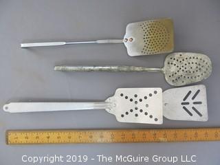 Collection of (4) slotted Spatulas (Note the sliding pocket handle of one) 