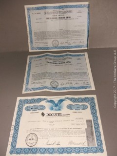 Collection of 45's and stock certificates