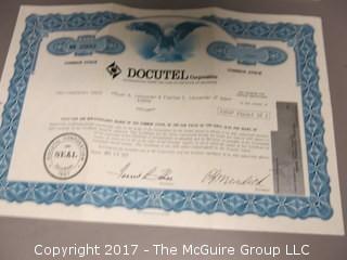 Collection of 45's and stock certificates