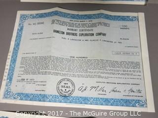 Collection of 45's and stock certificates