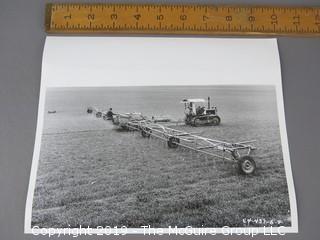 "Spraying Land"; unidentified location or photographer