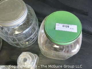 Assorted Shapes and Sizes of Clear Glass Canisters 