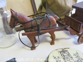 Collection including hand carved horse and coach; frames and lighters 