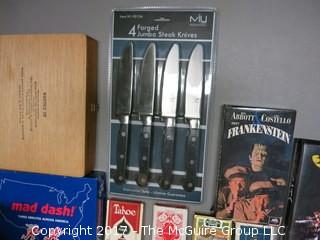 Collection including playing cards, cigar boxes, fishing tackle, keepsake box, Army backpack, NIB knife set and SHARP calculator