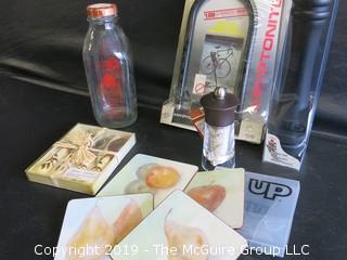 Collection including NOS Bike Lock, salt and pepper grinders, set of cheese knives, coasters, and Sherman Farm milk bottle