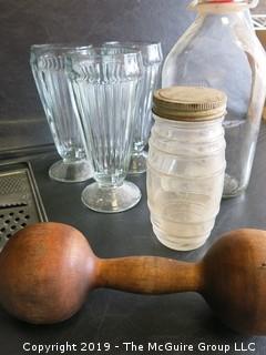 Collection including milk bottle, NJ license plates, wooden dumbell, (3) sofa fountain ice cream sundae glasses, kitchen grater and Zenith Radio